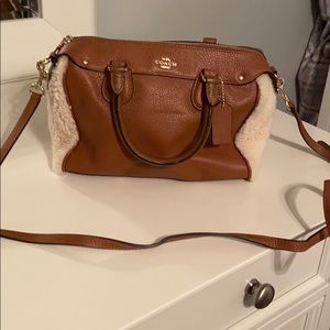 Brown Coach purse with Sherpa accents